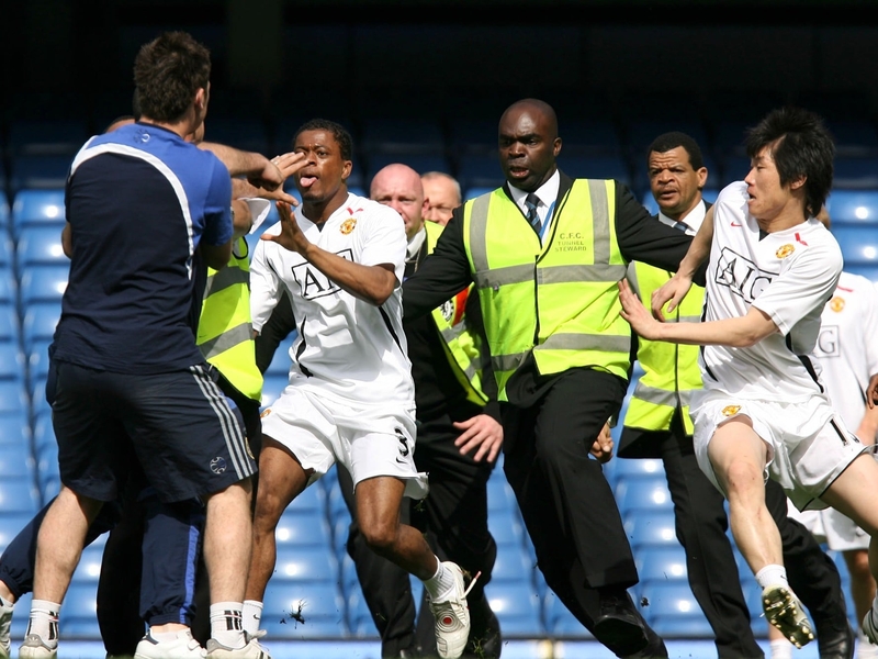 Patrice Evra will serve a four game ban for his part in a post-match brawl at Chelsea
