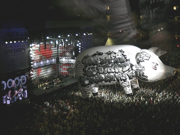 The huge inflatable pig drifted away