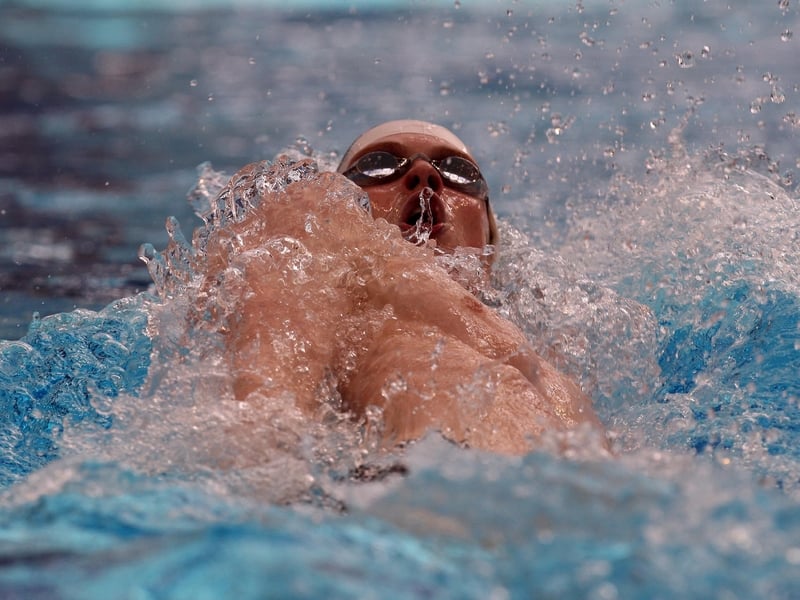 Karl Burdis won his 50m backstroke heat in Rome