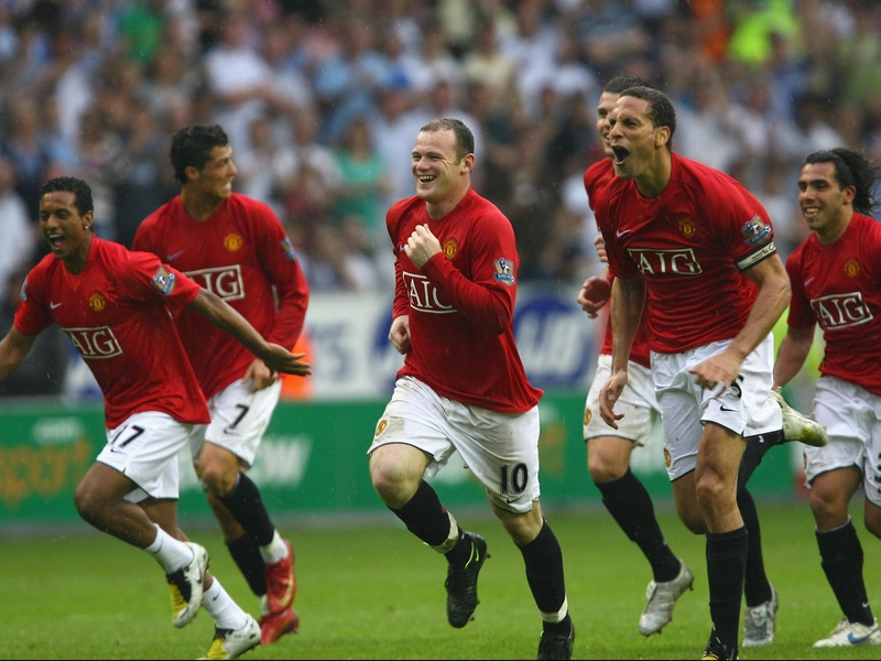 Manchester United claimed their 17th league title with a 2-0 win at Wigan