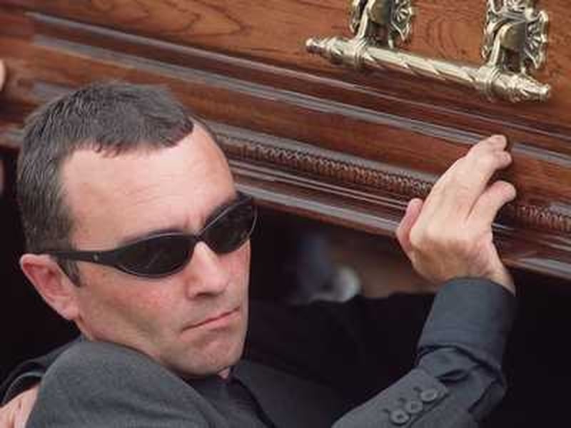 Tragedy has struck the Dunlop family again, with Robert (pictured carrying his brother Joey's coffin) the latest of the motorcycling dynasty to lose his life on a bike
