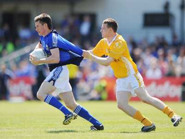 Mark Leddy of Cavan, in action against Antrim's Simon Dowds