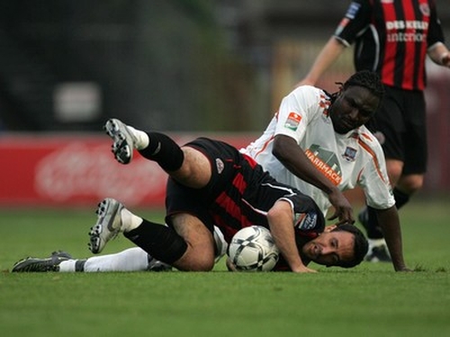 Bohs Neale Fenn and Wes Charles of Galway tussel for the ball