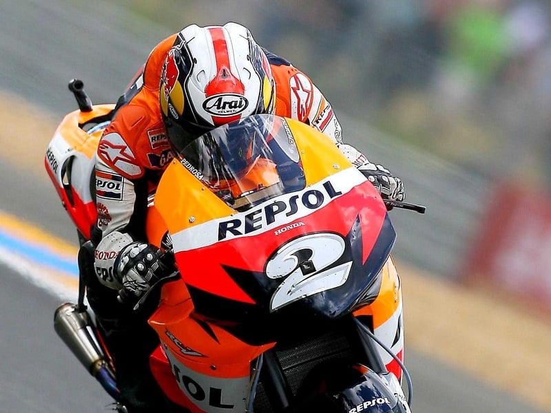 Dani Pedrosa (above) pipped Valentino Rossi to pole position in Sepang