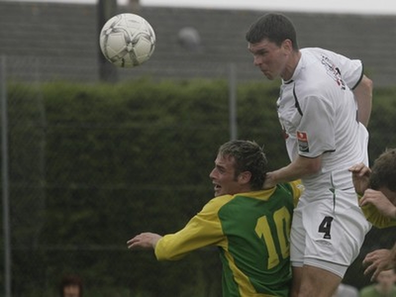 Bray's Andrew Myler rises above Rockmount's Allan Weldon
