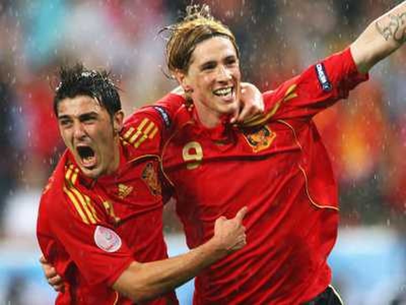 David Villa and Fernando Torres celebrate Spain's opener in Innsbruck