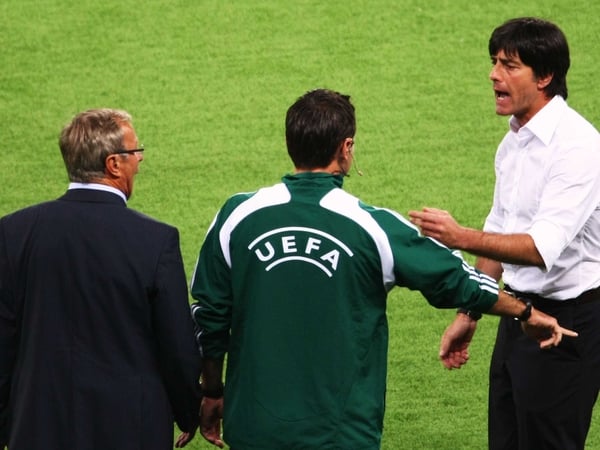Euro 2008 organisers will examine a referee's report on Tuesday before deciding on any disciplinary action against the Germany and Austria coaches who were both dismissed during their Group B match