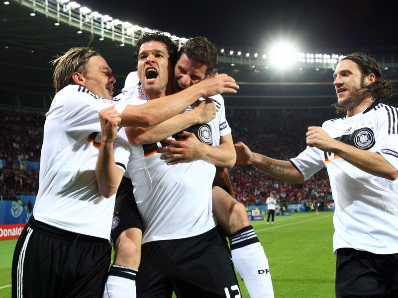 Michael Ballack leads his Germany team-mates into battle against Turkey in Basle on Wednesday night