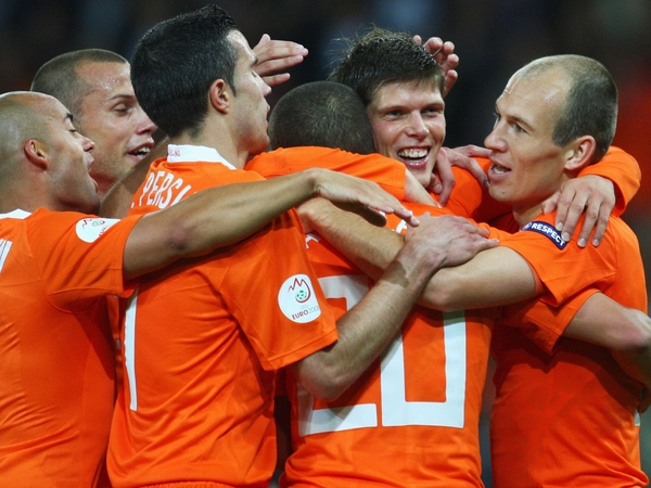 Klaas Jan Huntelaar celebrates scoring Netherland's opening goal against Romania
