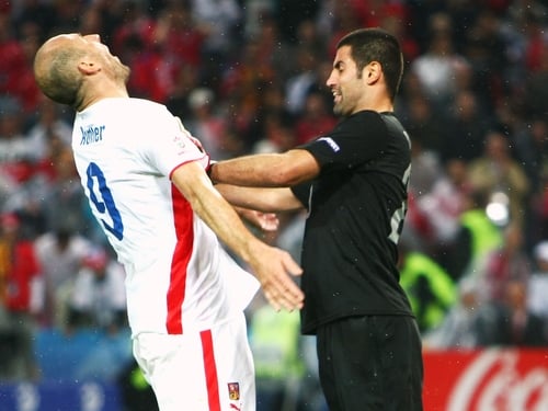 Volkan Demirel was sent off for this push on Jan Koller