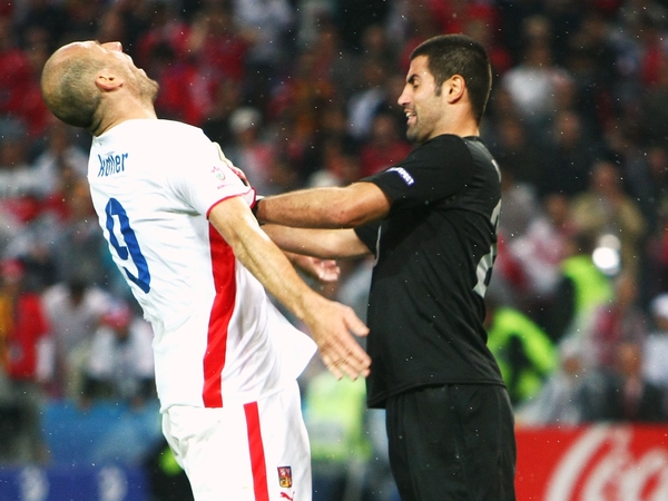 Volkan Demirel was sent off for this push on Jan Koller