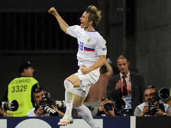 Spurs' Russian striker Roman Pavlyuchenko ended the Burnley dream