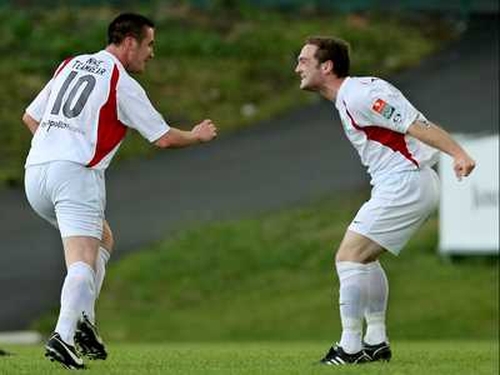Goalscorer Robbie Collins (l) is congratulated by Stephen McCrossan
