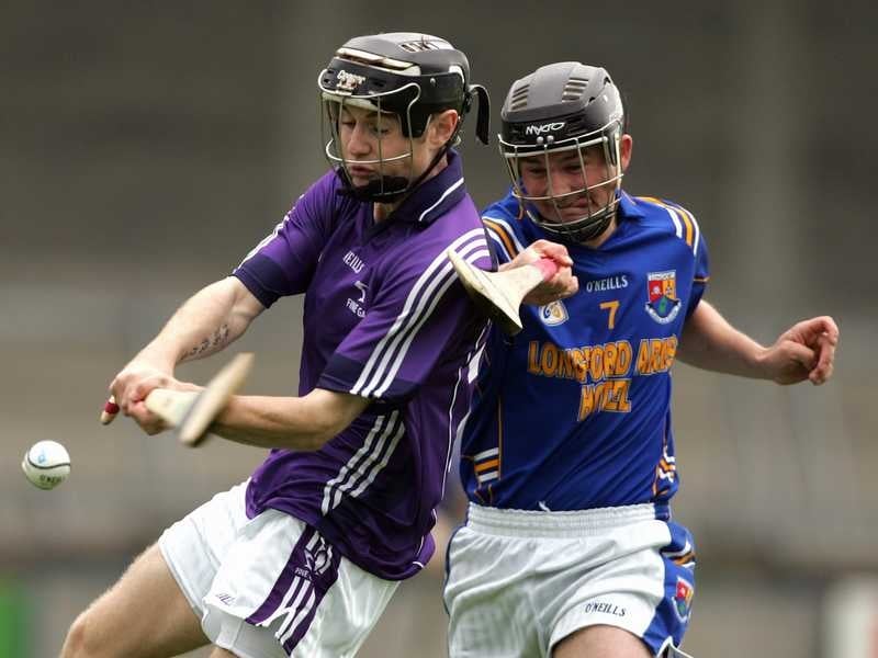 Fingal's John Matthew Sheridan under pressure from Conor Egan of Longford