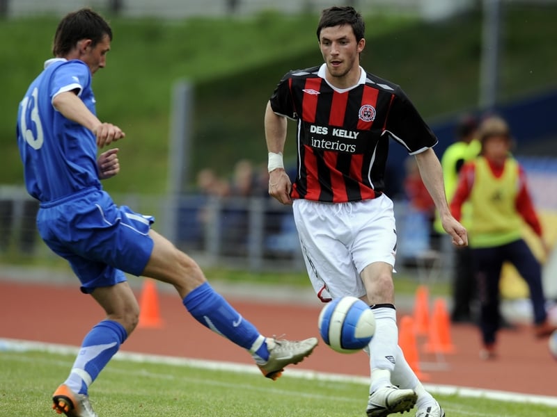 Killian Brennangoes tries to get past Andrei Agafonov of FK Riga