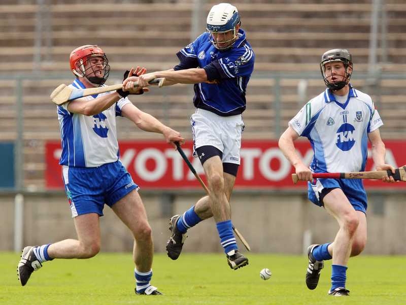 Cavan's Andrew Nelligan is surrounded by Monaghan's Michael Greaney and Stephen Lambe