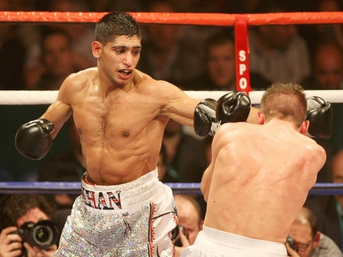 Amir Khan defeated Irishman Oisin Fagan in his comeback fight