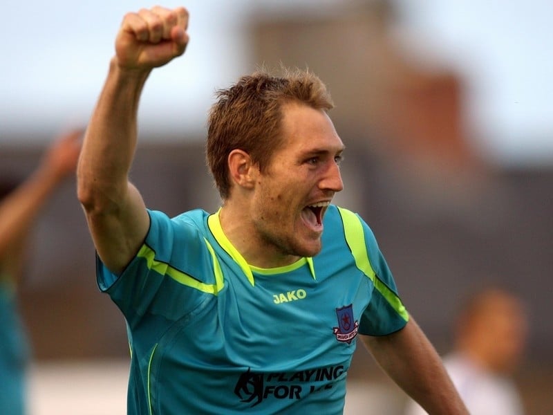 Adam Hughes celebrates his equaliser against Kiev