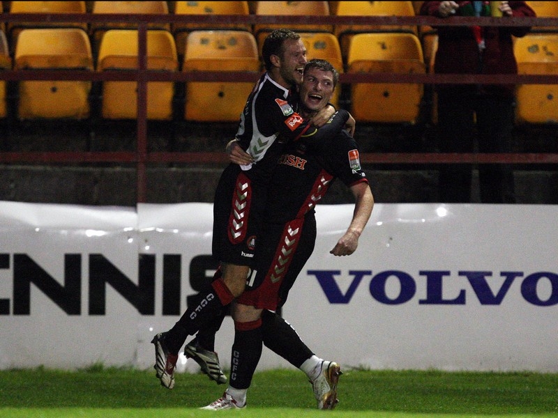 Cork City goalscorer Denis Behan celebrates with Pat Sullivan