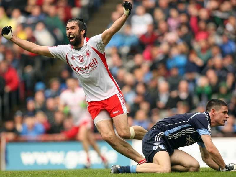 Joe McMahon celebrates after hitting the back of the net for Tyrone