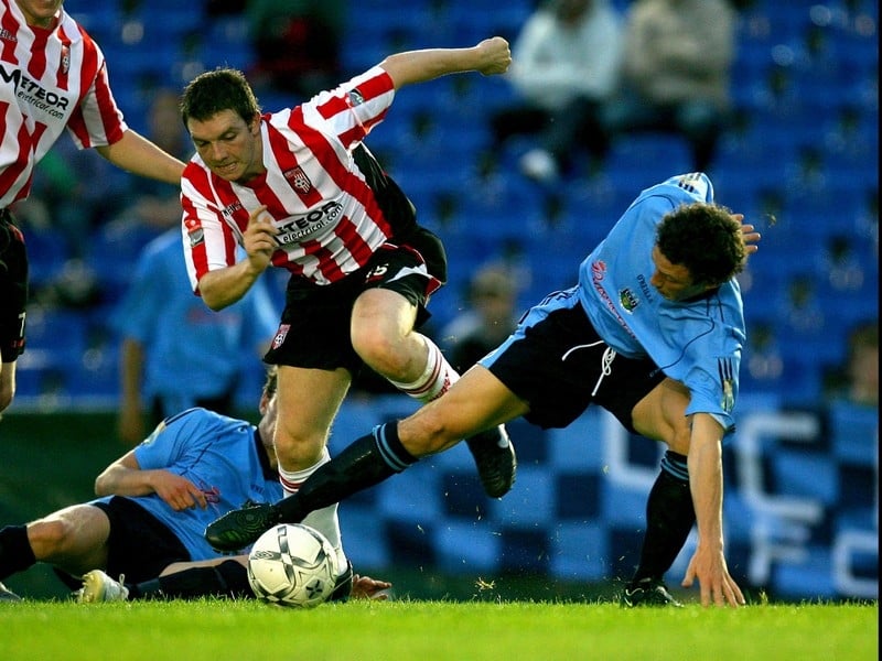 UCD's Brian King tussles with Derry's goalscorer Kevin Deery