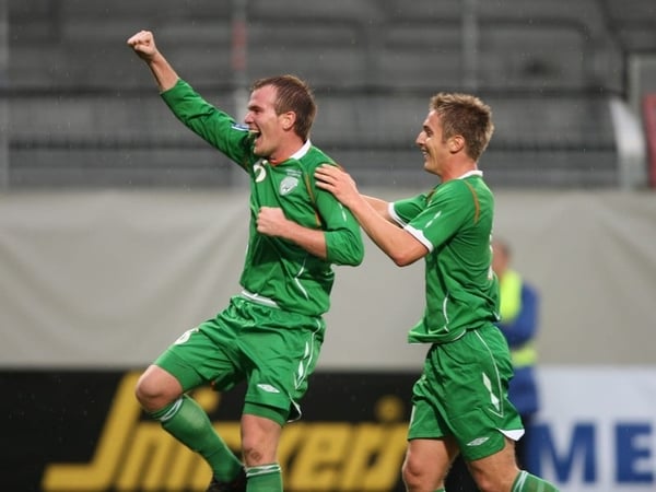 Glenn Whelan celebrates his first goal for Ireland with fellow goalscorer Kevin Doyle
