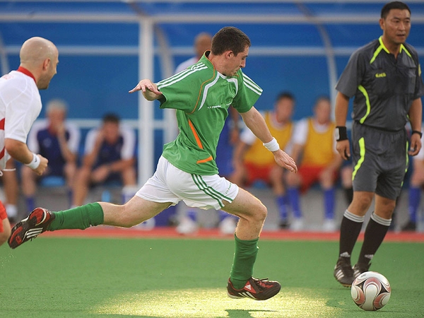Joe Markey strikes for Ireland's goal.