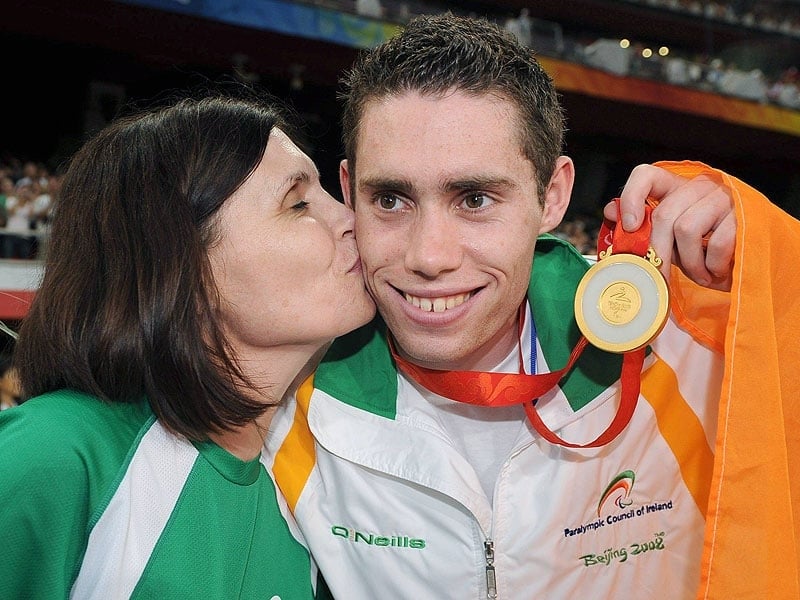 Jason Smyth with his mother Diane following his world record gold medal win.