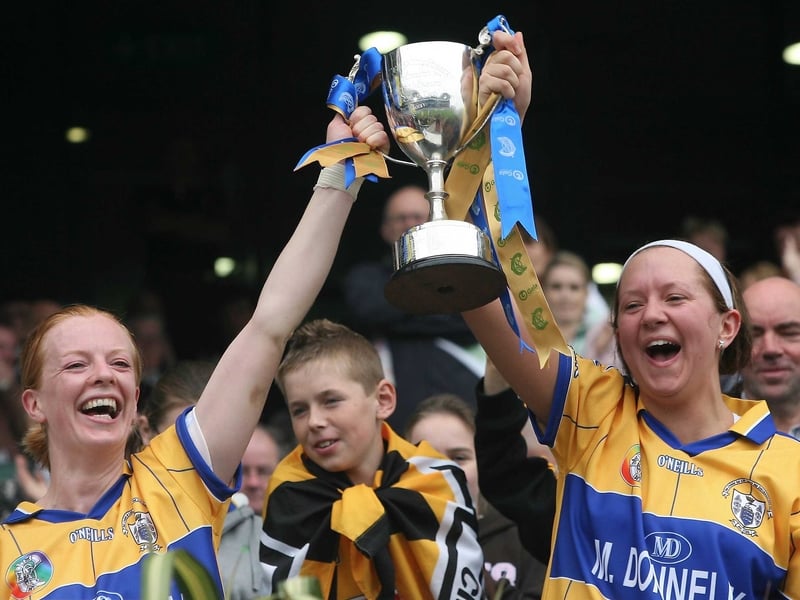 Captain Deirdre Murphy and vice-captain Sharon McMahon lift the trophy for Clare