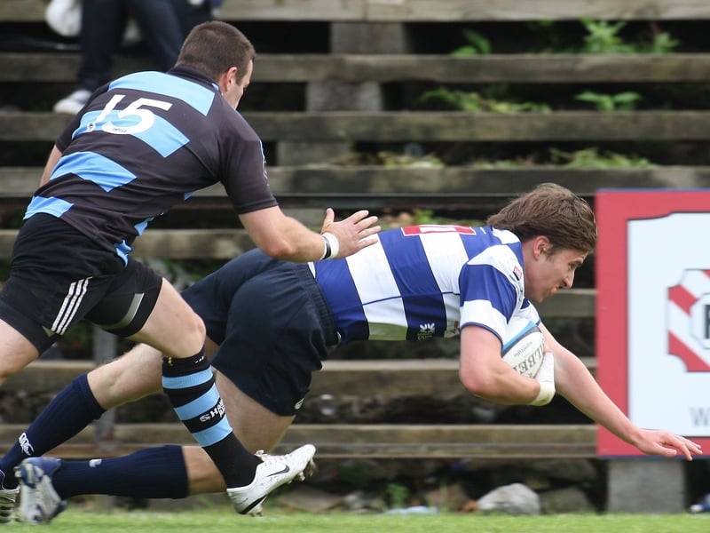 Rock's Darragh Fitzpatrick gets in for a try