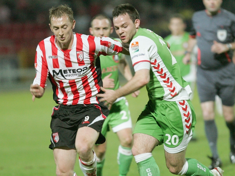 Goalscorer Timmy Kiely is challenged by Derry's Sammy Morrow