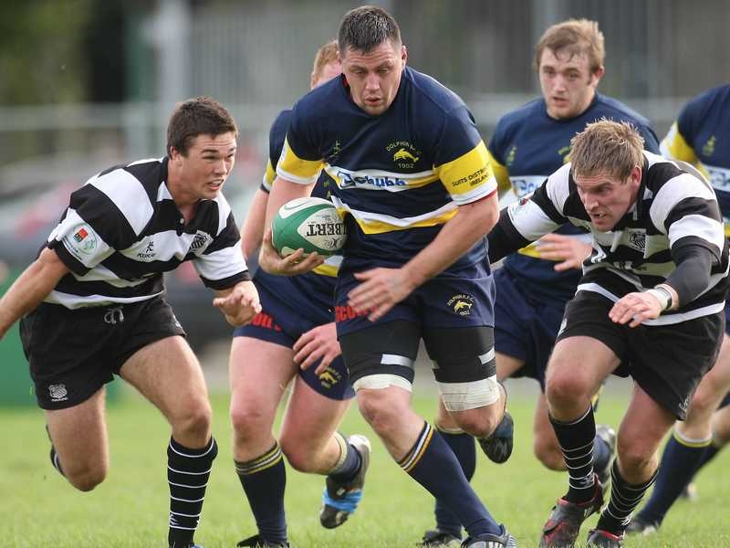 Dolphin try-scorer James Coughlan is pursued at Anglesea Road