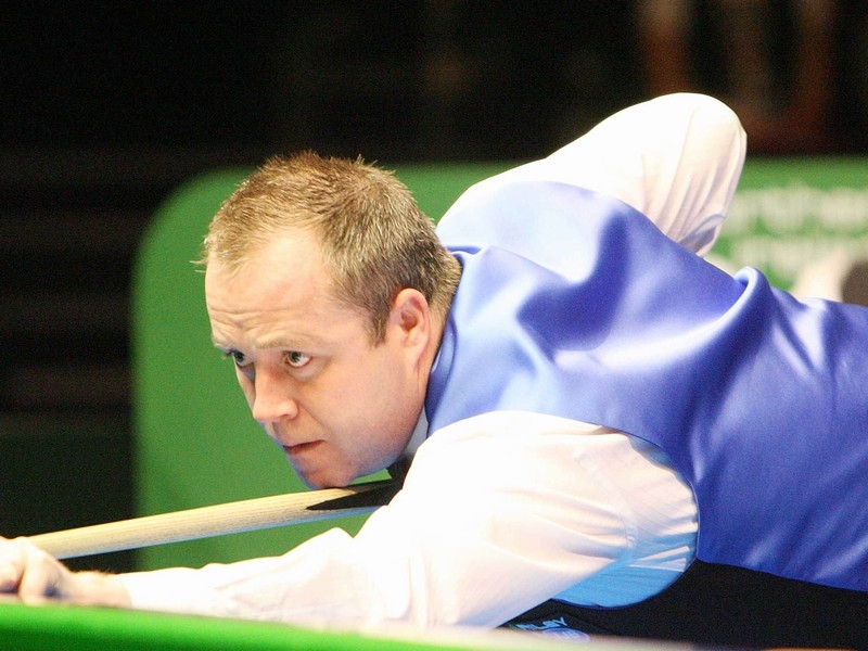 John Higgins edged past Ryan Day