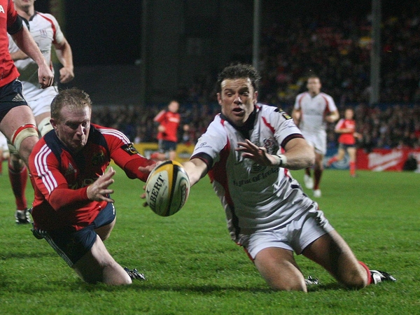 Ulster's Bryn Cunningham prevents Anthony Horgan from touching down for Munster