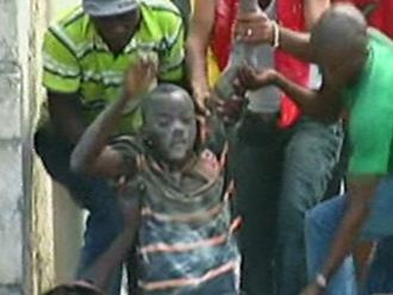 Haiti - Young boy is rescued
