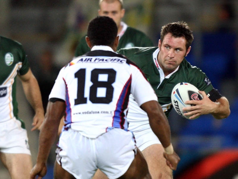 Ireland's Lee Doran runs at Sevanaia Kori of Fiji