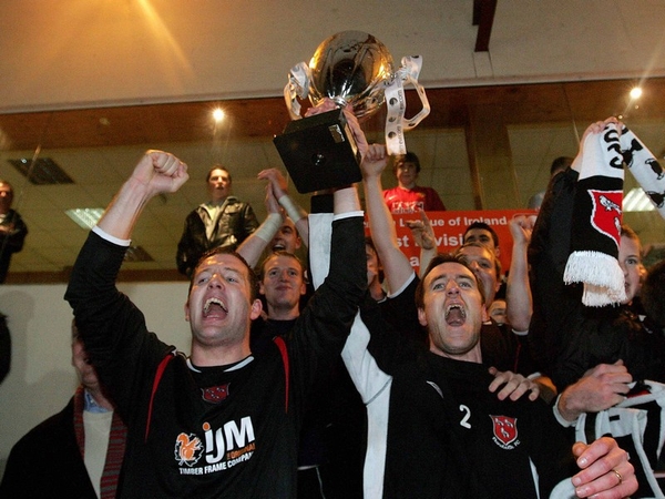Aidan Lynch &amp; John Flanagan lift the First Division trophy at Station Road