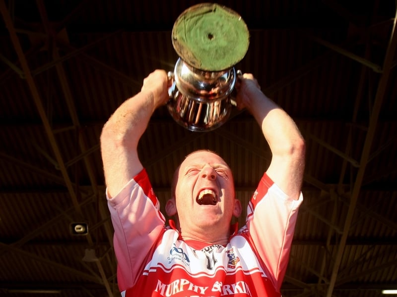 De La Salle's John Mullane holds aloft the O'Neill Cup last November