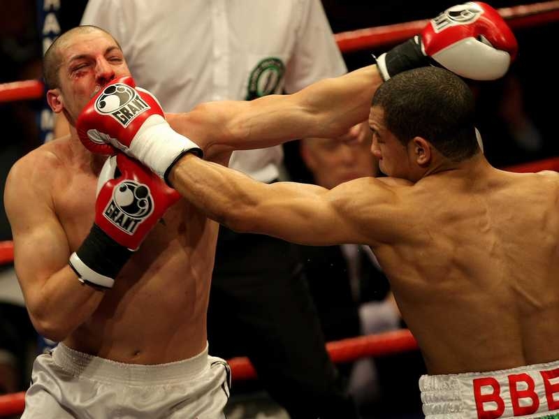 Boom! Darren Sutherland works on opening up Georgi Iliev's right eye with a powerful jab