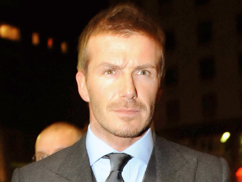 David Beckham was dressed by Dolce and Gabbana for his arrival in Milan