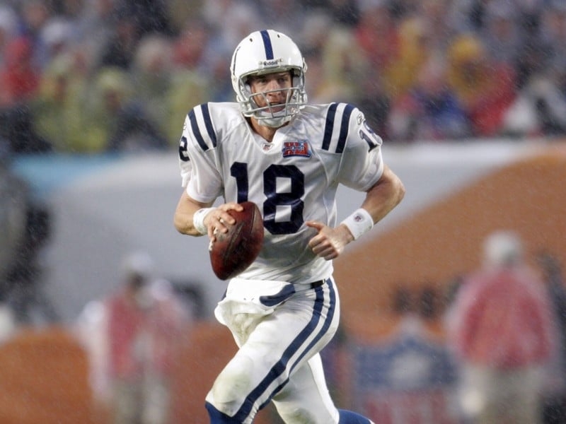 Peyton Manning threw three touchdown passes as the Colts beat the Jets