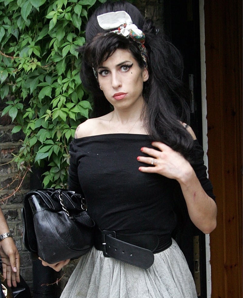 Winehouse - Reportedly wants to design for Fred Perry