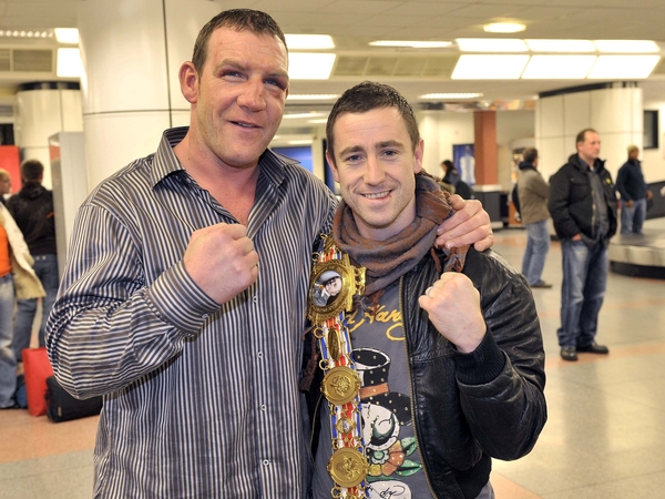 Martin Rogan(left), pictured with British light-welterweight champion Paul McCloskey, the day after the Belfast taxi driver stunned Audley Harrison with a points victory in London