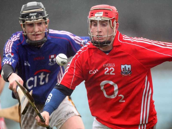 Paudie Lynch of Cork gets away from WIT's Barry Staunton