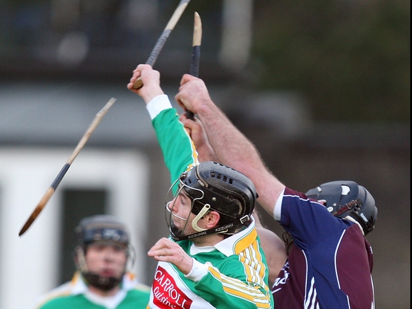Brendan Murphy of Offaly breaks the hurl of Galway's David Tierney