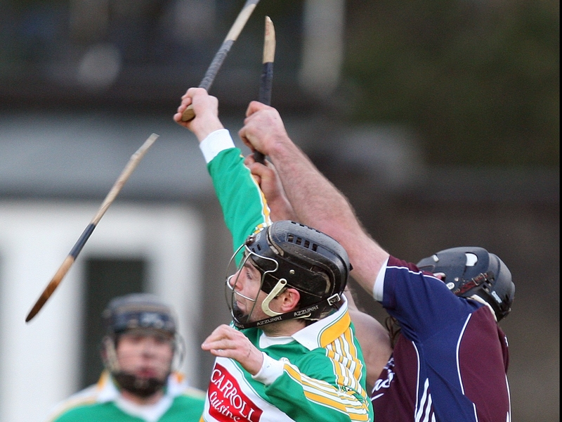 Brendan Murphy of Offaly breaks the hurl of Galway's David Tierney