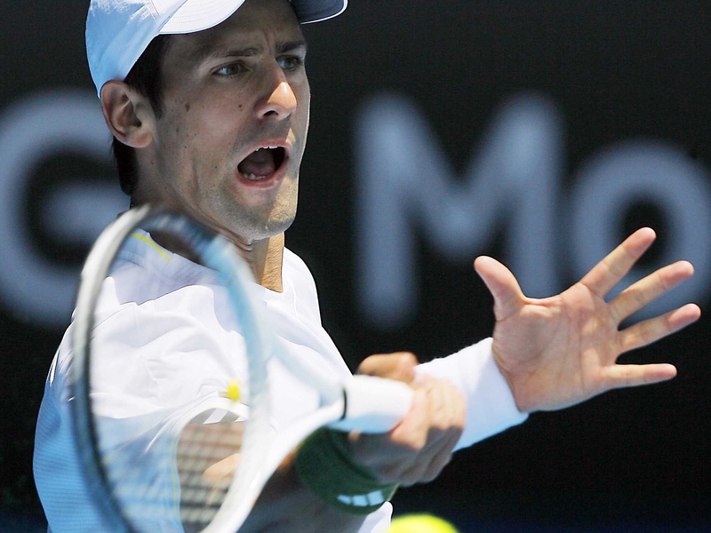 ‘The Djoker' cut a forlorn figure on Rod Laver Arena as temperatures soared to 35C