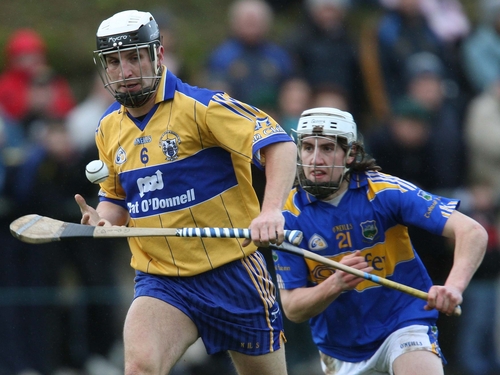 Clare's Gerry Quinn evades Tipperary goalscorer Patrick Maher