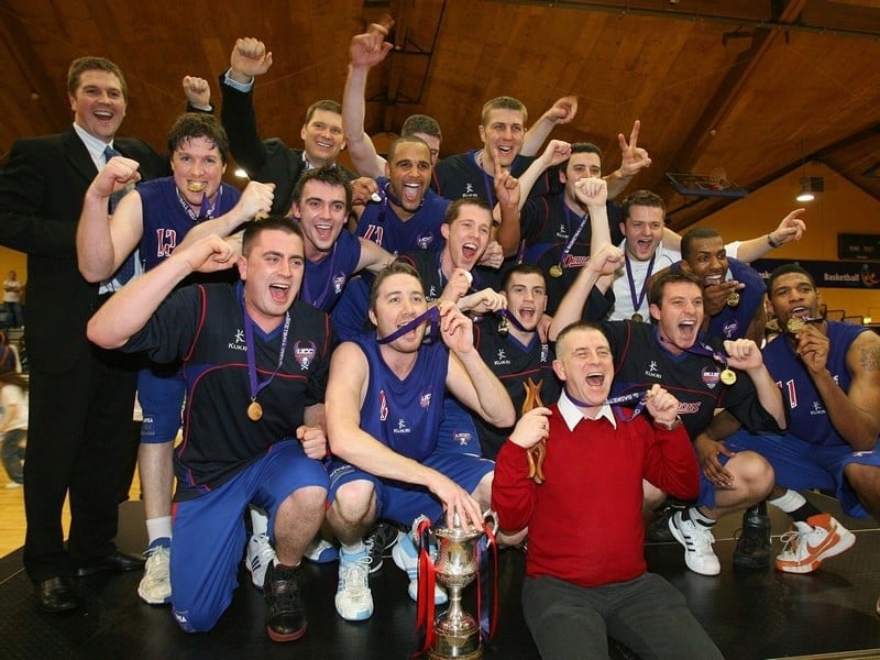 UCC Demons celebrate their victory at the NBA in Tallaght