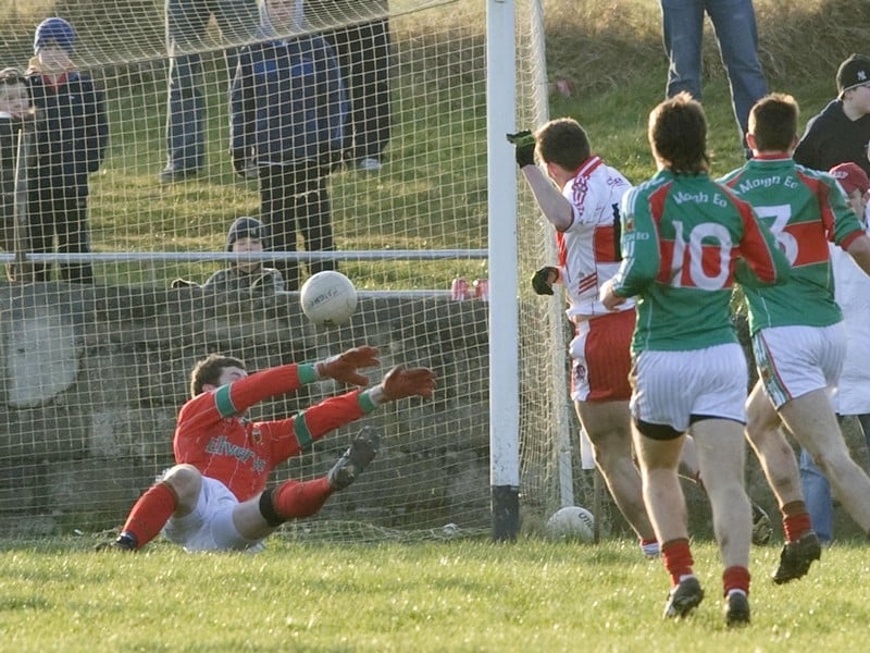James Kielt slots the ball past Mayo goalkeeper David Clarke to score the only goal